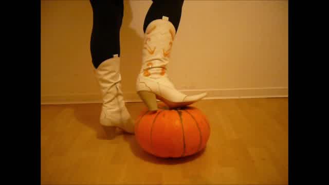 Jana crush a pumpkin with her high heel cowgirl boots white orange trailer