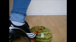 Jana crushes a watermelon with her Adidas soccer shoes trailer