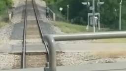 train driver honks at guy on railway