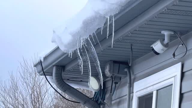 Icicles on the house - Recorded on February 23, 2023, from 5:23PM MT to 5:24PM MT