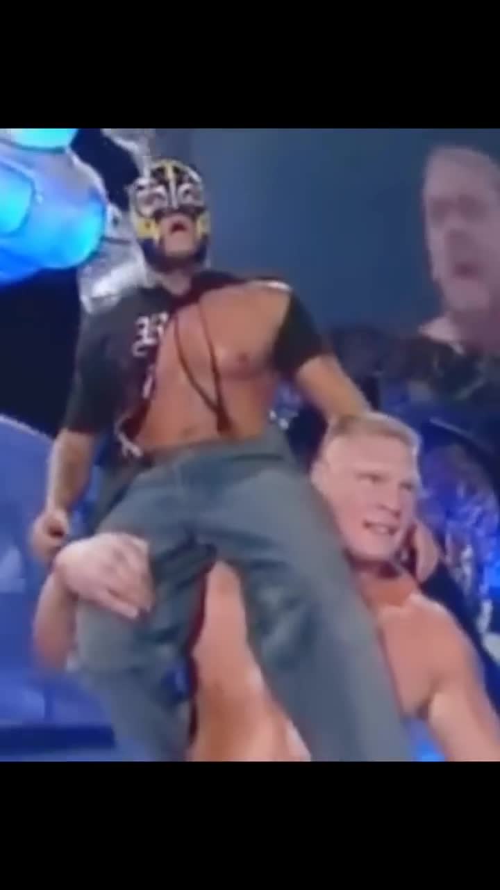 Brock LesnarSaves Rey Mysterio from Big Show 2003