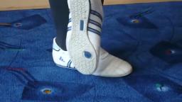 Jana shows her Adidas martial arts white, shiny blue