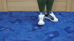 Jana shows her Adidas Superstar shiny blue with white stripes