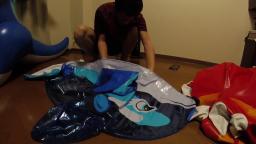 Riding and Deflating an Inflatable Dolphin